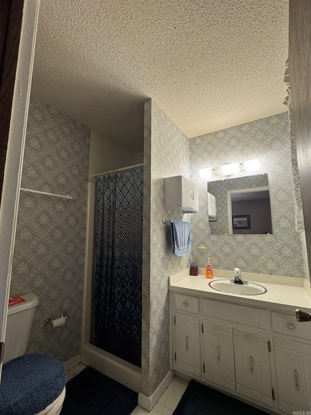 113 Boyd Rd, Southside, AR 72501 - full bathroom with vanity, toilet, a stall shower, a textured ceiling, and tile patterned flooring