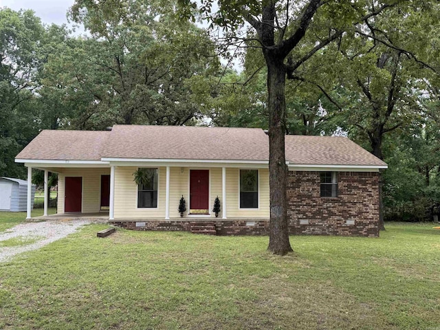 113 Boyd Rd, Southside, AR 72501 - single story home with crawl space, driveway, covered porch, a front lawn, and a carport