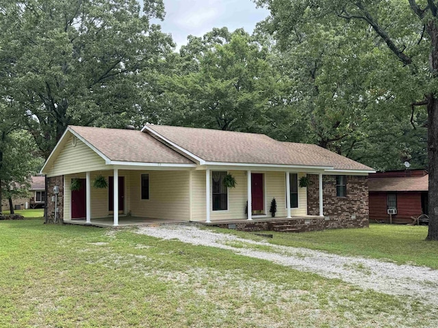 113 Boyd Rd, Southside, AR 72501 - ranch-style home featuring covered porch, an attached carport, a front lawn, and driveway