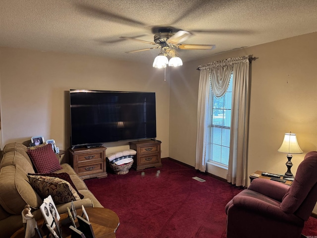 113 Boyd Rd, Southside, AR 72501 - living room featuring ceiling fan, dark carpet, and a textured ceiling