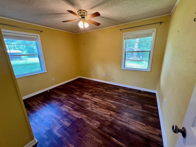 470 Lr 28, Foreman, AR 71836 - empty room featuring a textured ceiling, wood finished floors, ceiling fan, crown molding, and baseboards