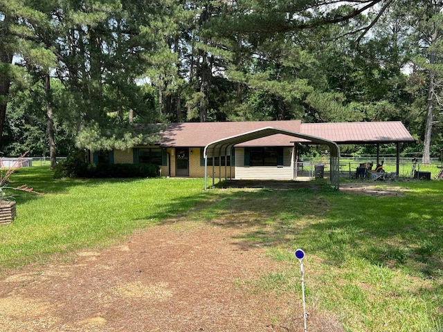 470 Lr 28, Foreman, AR 71836 - view of front of property featuring a carport and driveway