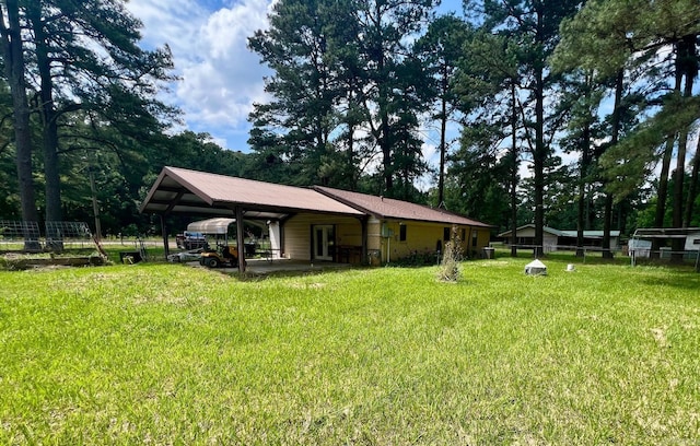 470 Lr 28, Foreman, AR 71836 - rear view of property with a carport