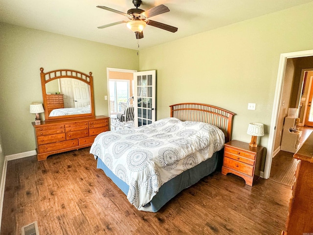 125 Gassaway, Searcy, AR 72143 - bedroom featuring wood finished floors, ceiling fan, and baseboards