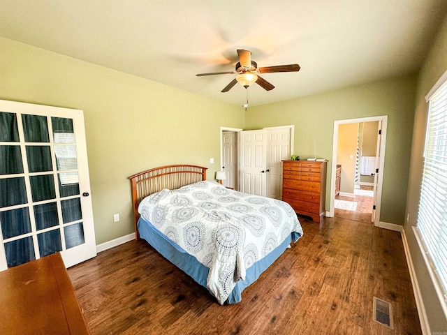 125 Gassaway, Searcy, AR 72143 - bedroom with wood finished floors, multiple windows, and baseboards