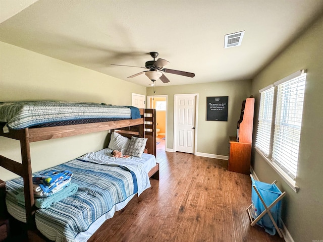 125 Gassaway, Searcy, AR 72143 - bedroom with baseboards, wood finished floors, and a ceiling fan