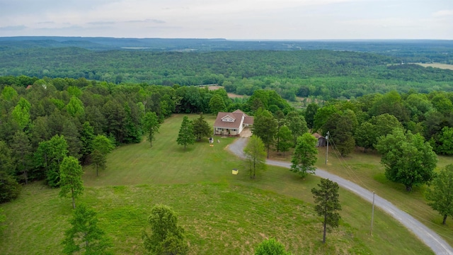 125 Gassaway, Searcy, AR 72143 - view of subject property featuring a heavily wooded area