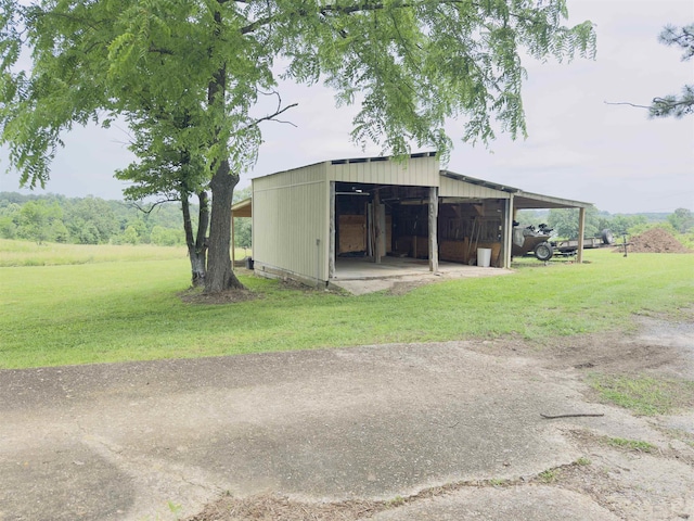 9689 W Ar 56th Hwy, Wideman, AR 72585 - view of pole building featuring a lawn