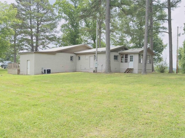 9689 W Ar 56th Hwy, Wideman, AR 72585 - rear view of property with entry steps, cooling unit, and a lawn