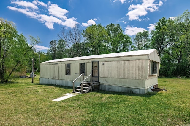 313 W Miller St, Gurdon, AR 71743 - manufactured / mobile home featuring a front yard
