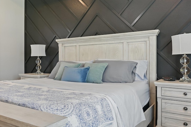 10584 Gunter Loop, Benton, AR 72019 - bedroom with a decorative wall and vaulted ceiling