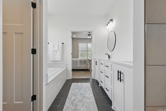 10584 Gunter Loop, Benton, AR 72019 - full bath featuring double vanity, a bath, ceiling fan, and tile patterned floors