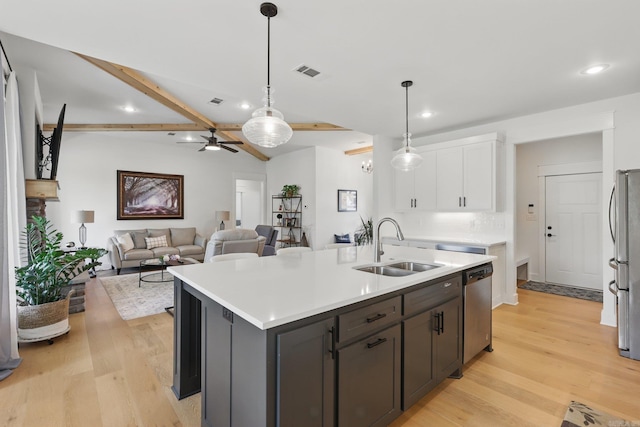 10584 Gunter Loop, Benton, AR 72019 - kitchen with a sink, white cabinetry, appliances with stainless steel finishes, light wood-style flooring, and recessed lighting