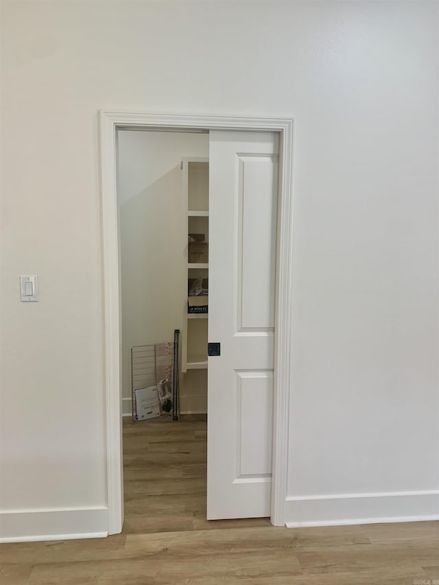12409 Styles Rd, Bauxite, AR 72011 - corridor with light wood-style floors and baseboards