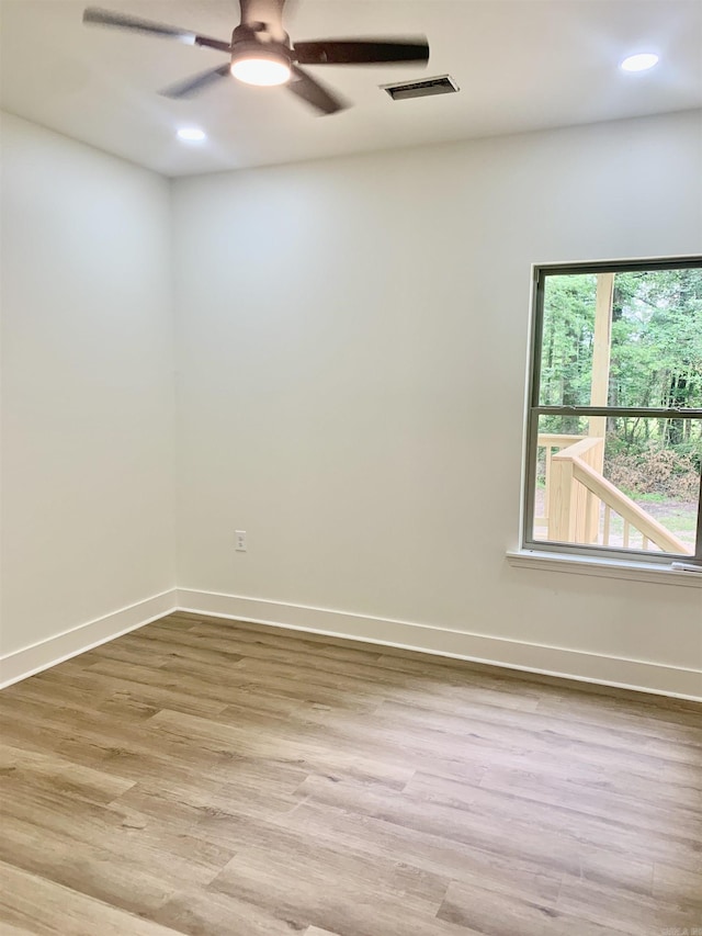 12409 Styles Rd, Bauxite, AR 72011 - empty room featuring light wood-type flooring, baseboards, a ceiling fan, and recessed lighting