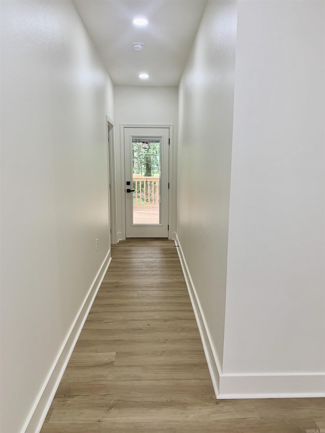 12409 Styles Rd, Bauxite, AR 72011 - corridor with baseboards, light wood finished floors, and recessed lighting