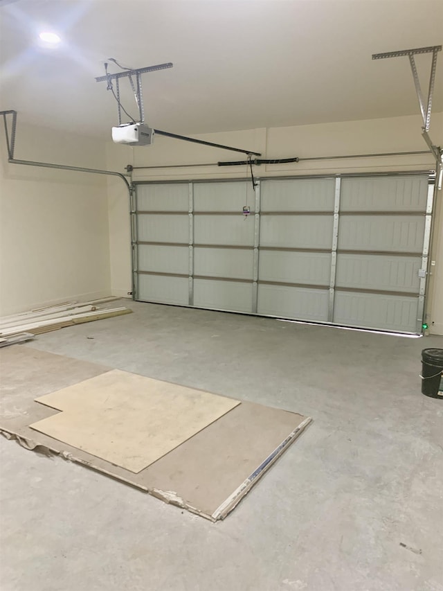 12409 Styles Rd, Bauxite, AR 72011 - garage featuring a garage door opener
