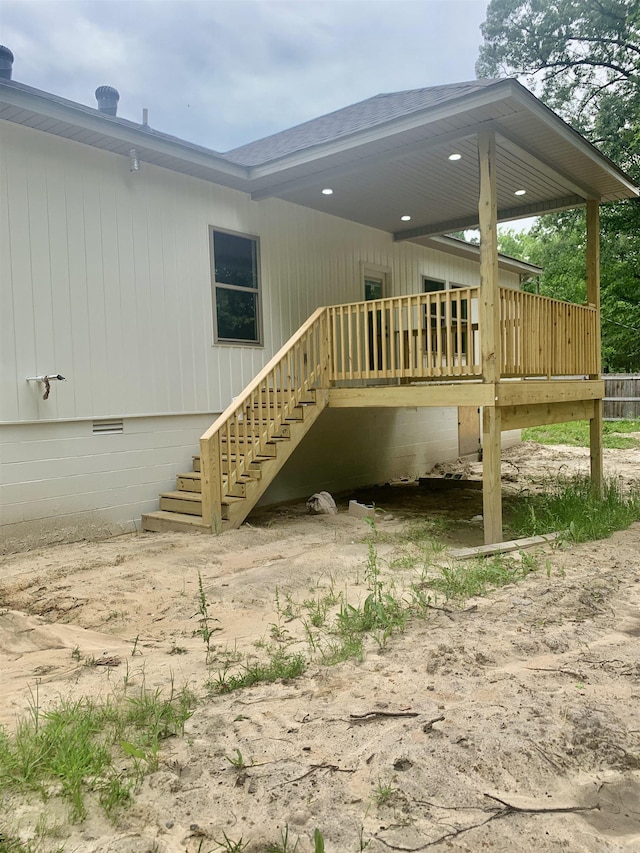 12409 Styles Rd, Bauxite, AR 72011 - back of house with crawl space, a shingled roof, a wooden deck, and stairway