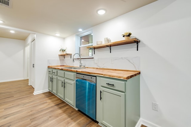 3316 Carmine Cv, Bryant, AR 72202 - indoor wet bar featuring dishwasher, light wood-type flooring, decorative backsplash, recessed lighting, and baseboards
