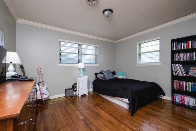 122 Glen Dr, Little Rock, AR 72207 - bedroom with crown molding, dark wood-style floors, multiple windows, and baseboards