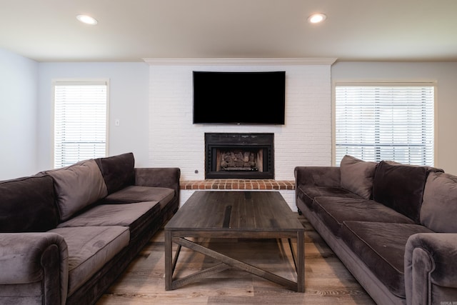 122 Glen Dr, Little Rock, AR 72207 - living area with a fireplace, wood finished floors, and recessed lighting