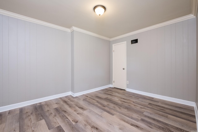122 Glen Dr, Little Rock, AR 72207 - unfurnished room with wood finished floors, ornamental molding, and baseboards