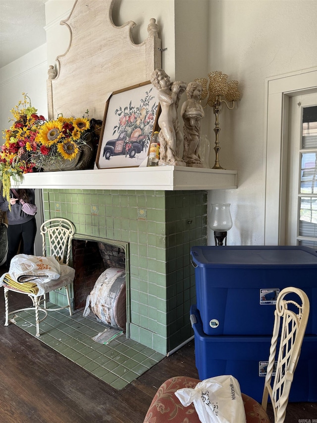 211 California Ave, Camden, AR 71701 - detailed view of wood finished floors and a tile fireplace