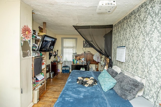 331 N Park St, Little Rock, AR 72205 - bedroom featuring a textured ceiling and wood finished floors