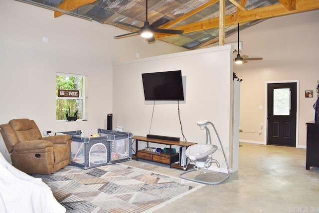 312 Broken Bow Trl, Lonsdale, AR 72087 - living area with a ceiling fan, high vaulted ceiling, concrete floors, and baseboards