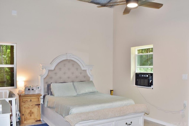 312 Broken Bow Trl, Lonsdale, AR 72087 - bedroom with cooling unit, baseboards, a high ceiling, and a ceiling fan