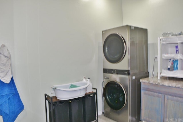 312 Broken Bow Trl, Lonsdale, AR 72087 - laundry area with estacked washer and dryer
