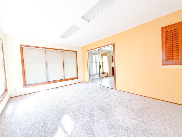 1908 Honeysuckle Dr, Mountain Home, AR 72653 - unfurnished room with carpet floors and a baseboard radiator