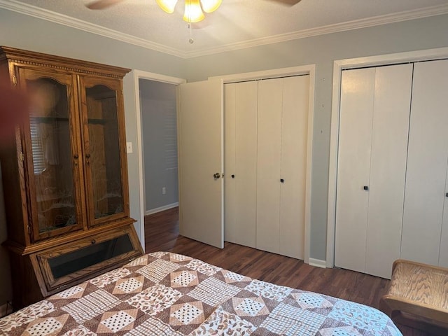 53 Iowa Dr, Cherokee Village, AR 72529 - bedroom featuring multiple closets, wood finished floors, ornamental molding, baseboards, and a ceiling fan