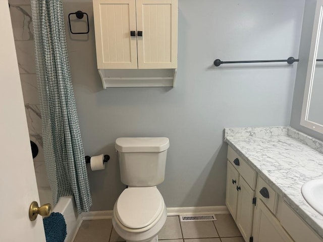 53 Iowa Dr, Cherokee Village, AR 72529 - bathroom with vanity, toilet, shower / bath combo with shower curtain, tile patterned flooring, and baseboards
