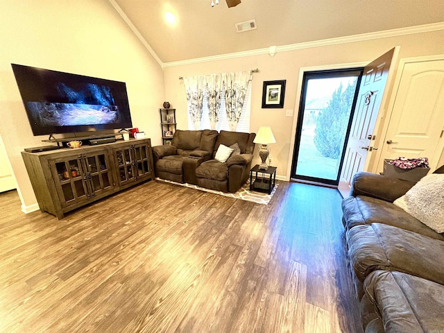 135 Meadow Dr, Beebe, AR 72012 - living room featuring wood finished floors, lofted ceiling, a ceiling fan, baseboards, and ornamental molding