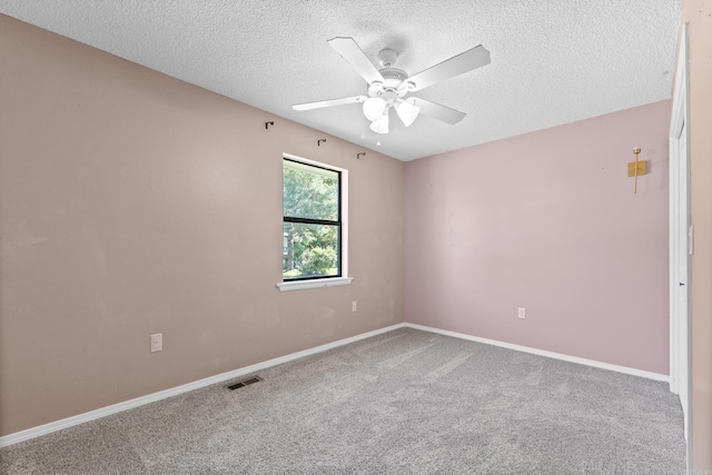 1214 Sammy St, Mountain Home, AR 72653 - carpeted empty room featuring ceiling fan, a textured ceiling, and baseboards