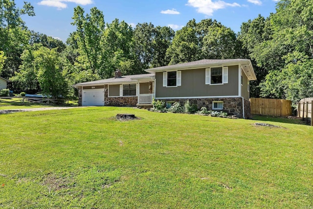 1214 Sammy St, Mountain Home, AR 72653 - split level home featuring stone siding, an attached garage, driveway, and a chimney