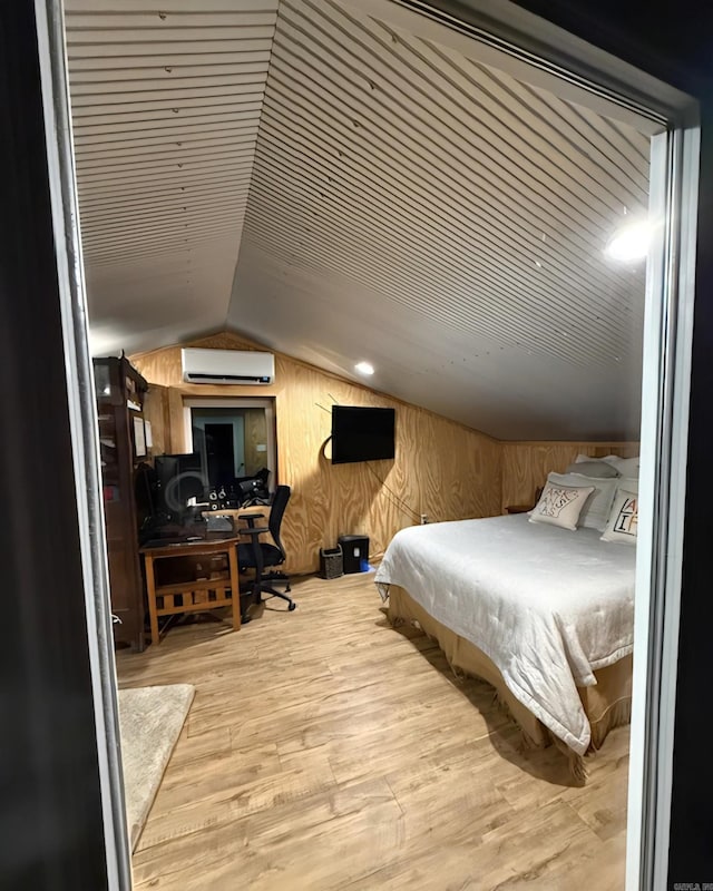 630 Cliffview Dr, Quitman, AR 72131 - bedroom with a wall mounted AC, lofted ceiling, wood finished floors, an office area, and wood walls