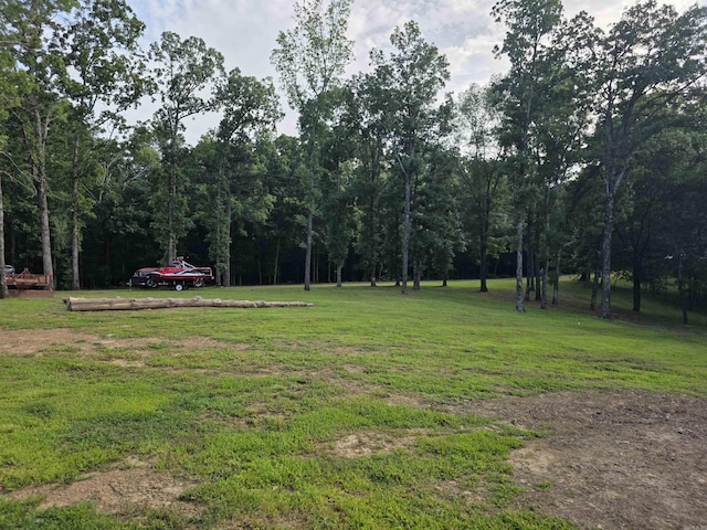 630 Cliffview Dr, Quitman, AR 72131 - view of grassy yard featuring a wooded view