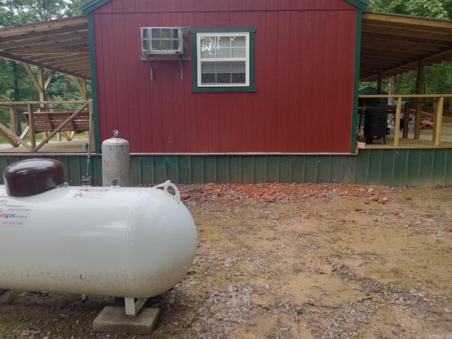 8923 Misenheimer Rd, Mountain View, AR 72560 - view of home's exterior featuring an AC wall unit and a deck