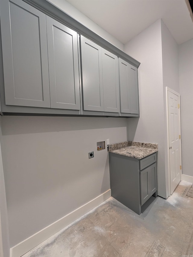 1505 S State, Little Rock, AR 72202 - laundry area featuring cabinet space, baseboards, hookup for a washing machine, and electric dryer hookup