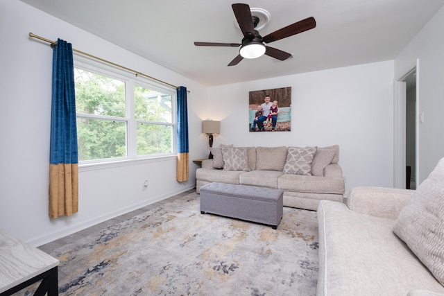 4605 N Cedar, North Little Rock, AR 72116 - living area featuring healthy amount of natural light, a ceiling fan, and baseboards