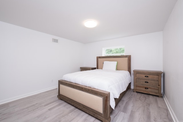 4605 N Cedar, North Little Rock, AR 72116 - bedroom featuring light wood finished floors and baseboards