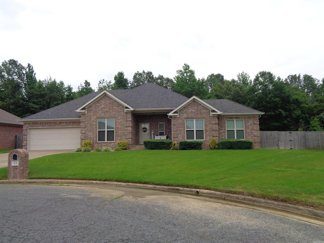 21 Sanibel Cv, Little Rock, AR 72210 - view of front of house featuring brick siding, an attached garage, concrete driveway, and a shingled roof