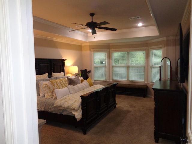 21 Sanibel Cv, Little Rock, AR 72210 - bedroom featuring a raised ceiling, crown molding, multiple windows, carpet floors, and ceiling fan