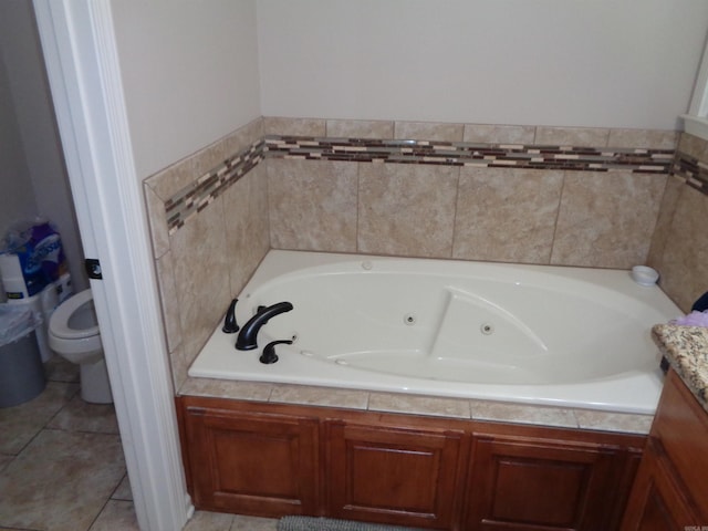 21 Sanibel Cv, Little Rock, AR 72210 - full bathroom with a tub with jets, toilet, and tile patterned flooring