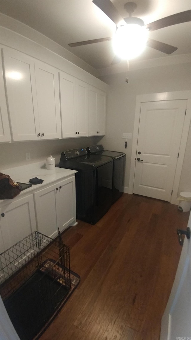 1927 College Ave, Conway, AR 72034 - washroom with washing machine and dryer, ceiling fan, dark wood-style floors, and cabinet space
