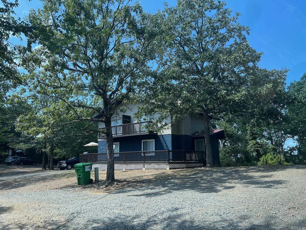 23 Bryant Ave, Oppelo, AR 72110 - view of front of house featuring a balcony