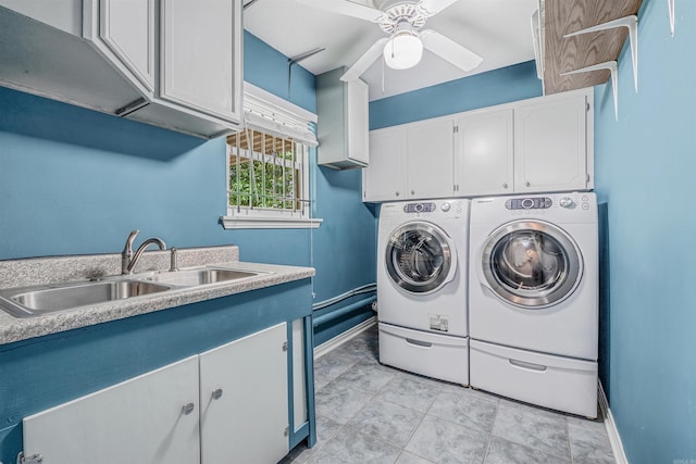 4204 Fox Hill Rd, North Little Rock, AR 72116 - laundry area featuring washing machine and dryer, cabinet space, a ceiling fan, and baseboards