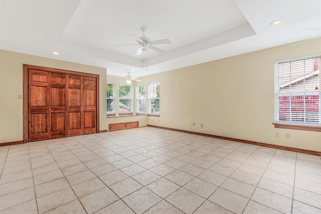 4204 Fox Hill Rd, North Little Rock, AR 72116 - unfurnished room featuring a tray ceiling, ceiling fan, baseboards, and recessed lighting